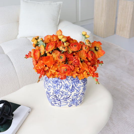 Bright Orange Faux Blooms in Decorative Vase